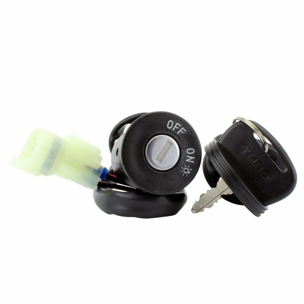 Black cylindrical ignition key switch with white OFF and ON markings, metal key inserted, and white plastic connector.