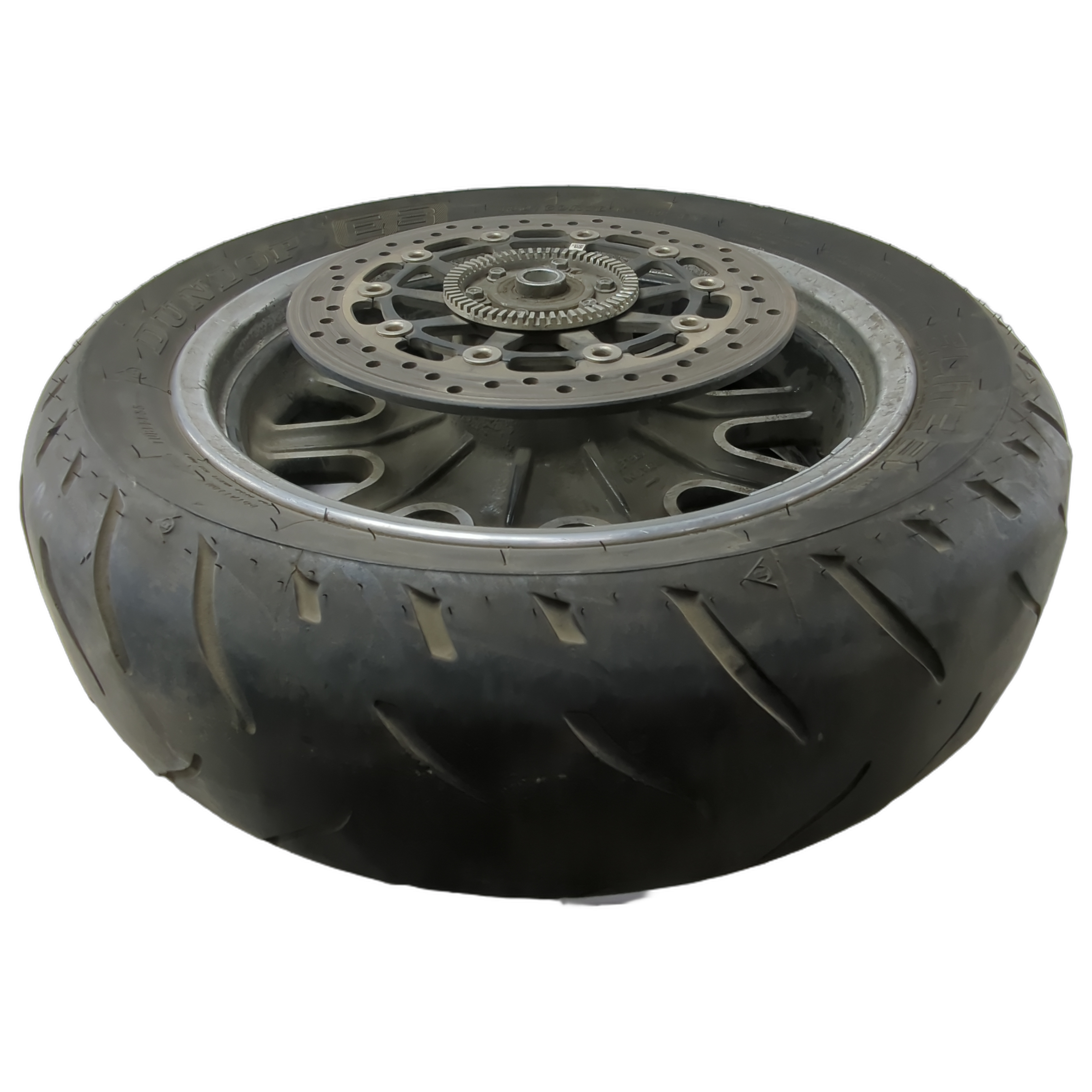 16x5.0 black cast rear motorcycle wheel with Dunlop tire and silver brake rotor.