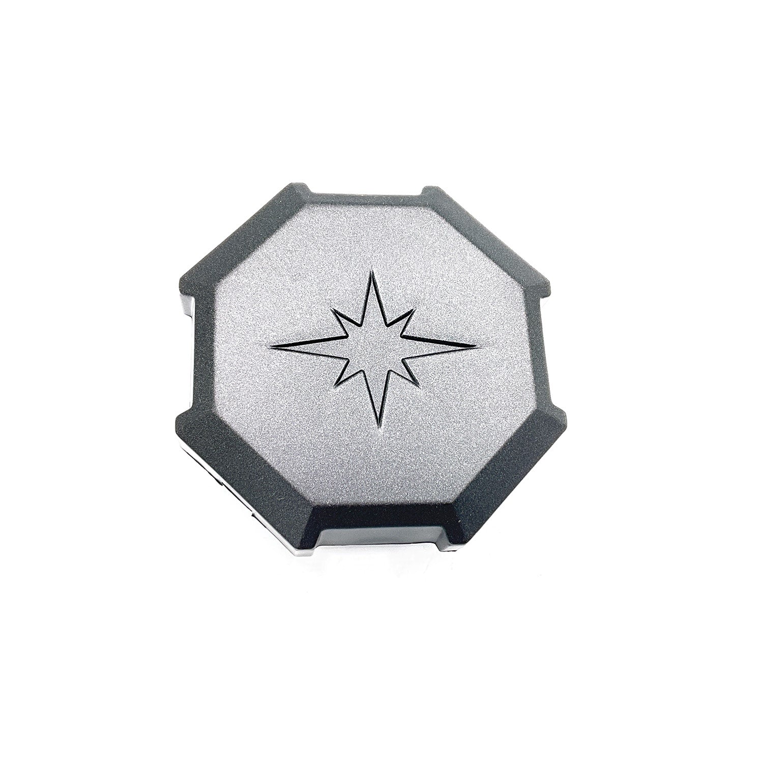 Black and silver octagonal rim cap with embossed Polaris star logo in center.
