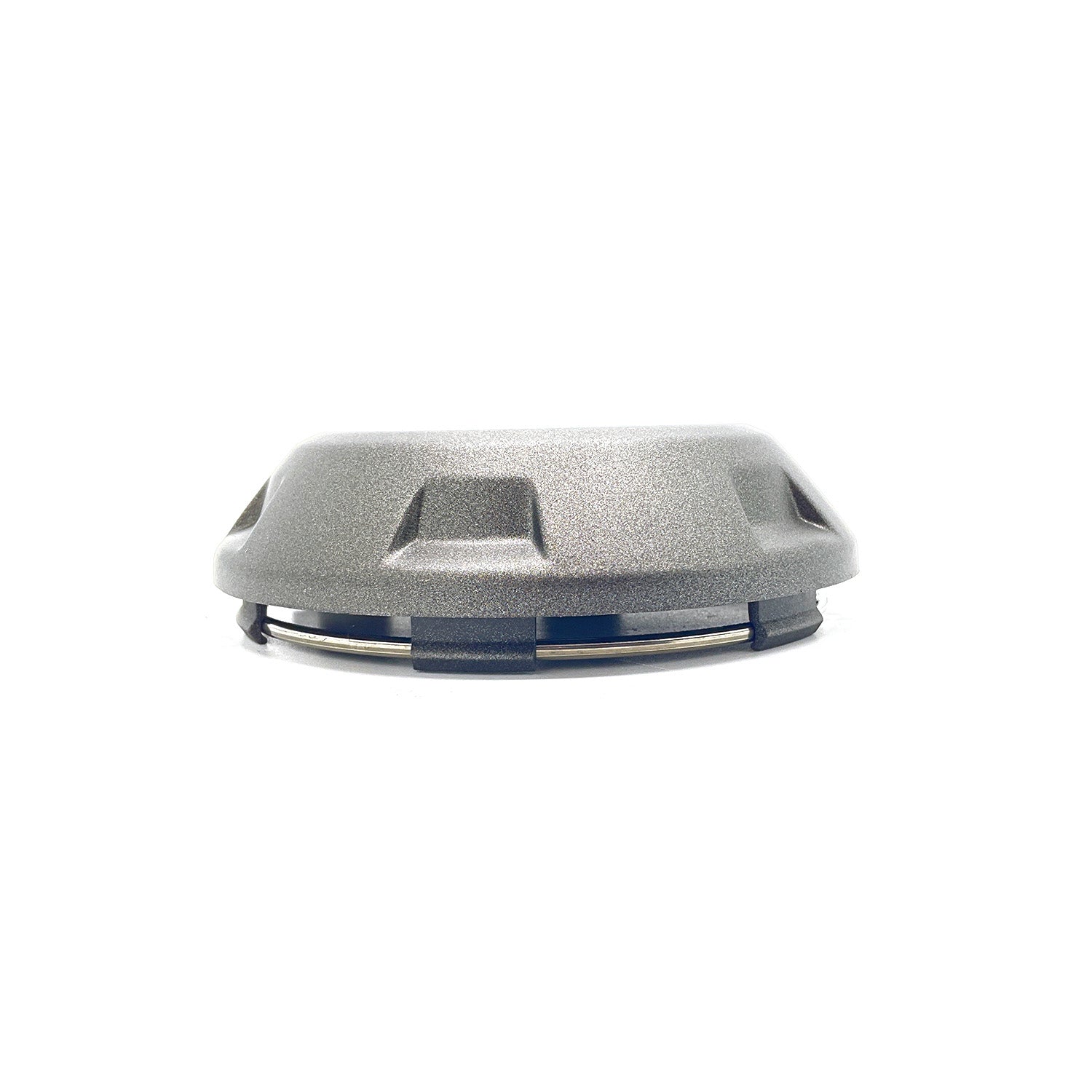 Silver metallic Polaris hub cap with a circular, slightly domed shape and recessed accents.