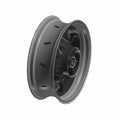 Black cast aluminum 17x5.5 motorcycle rear wheel with multiple spokes and central hub opening.