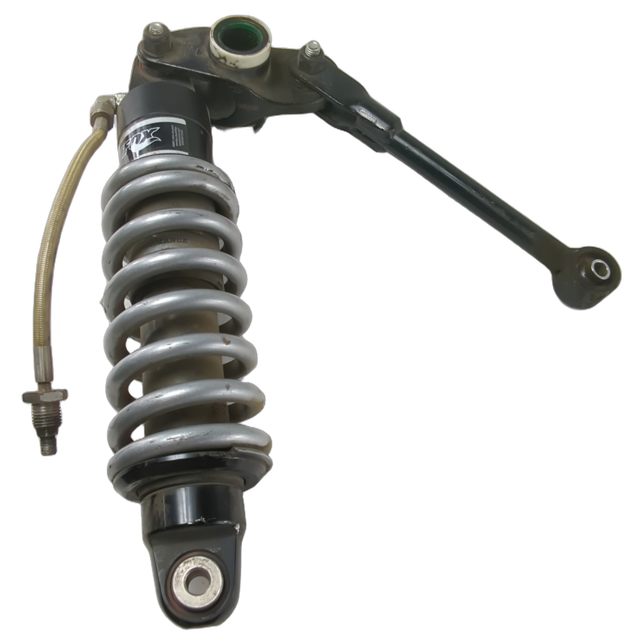 Black and silver touring shock absorber with coiled spring and attached lowering link for motorcycle suspension.