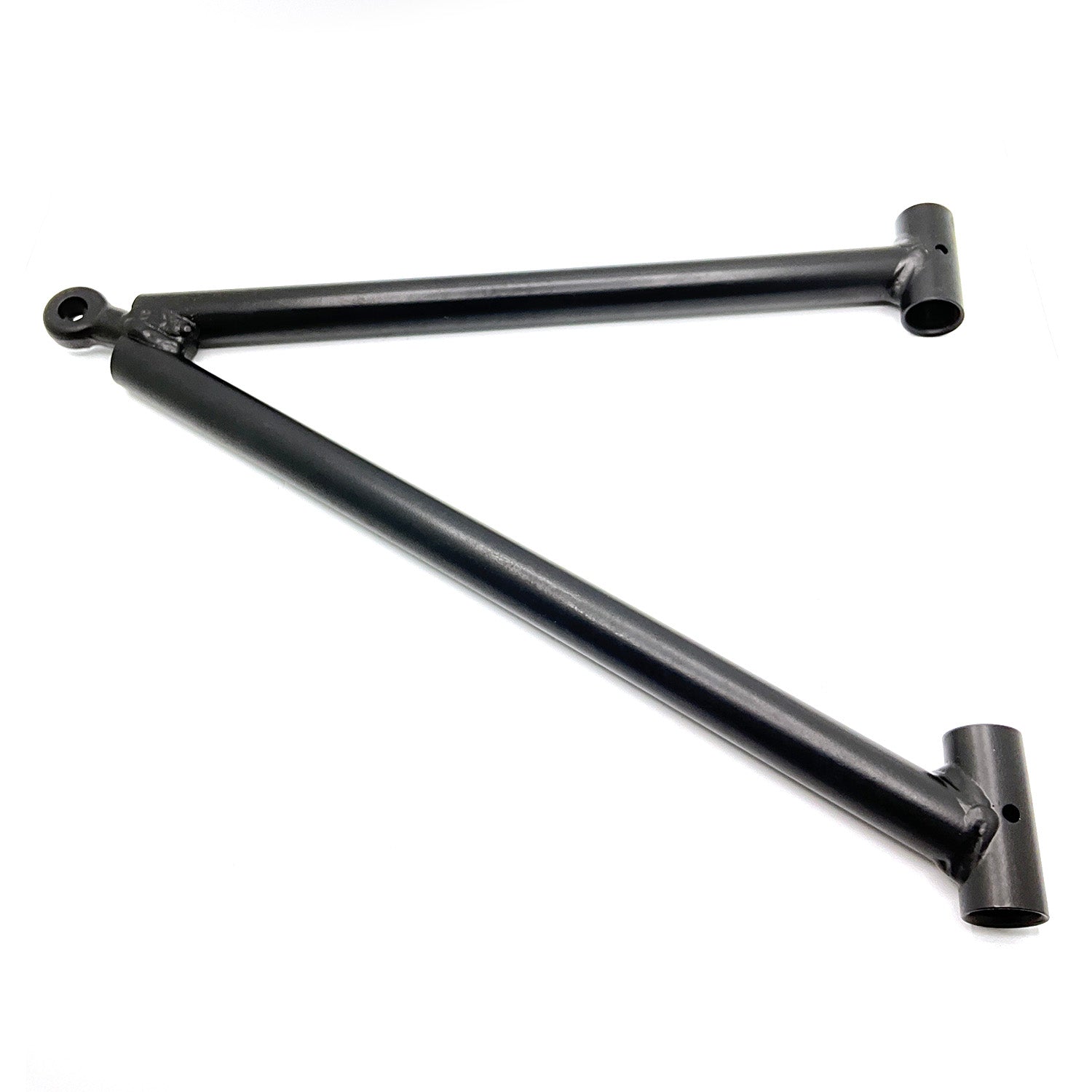 Matte black metal A-arm suspension part with cylindrical mounting points on each end.