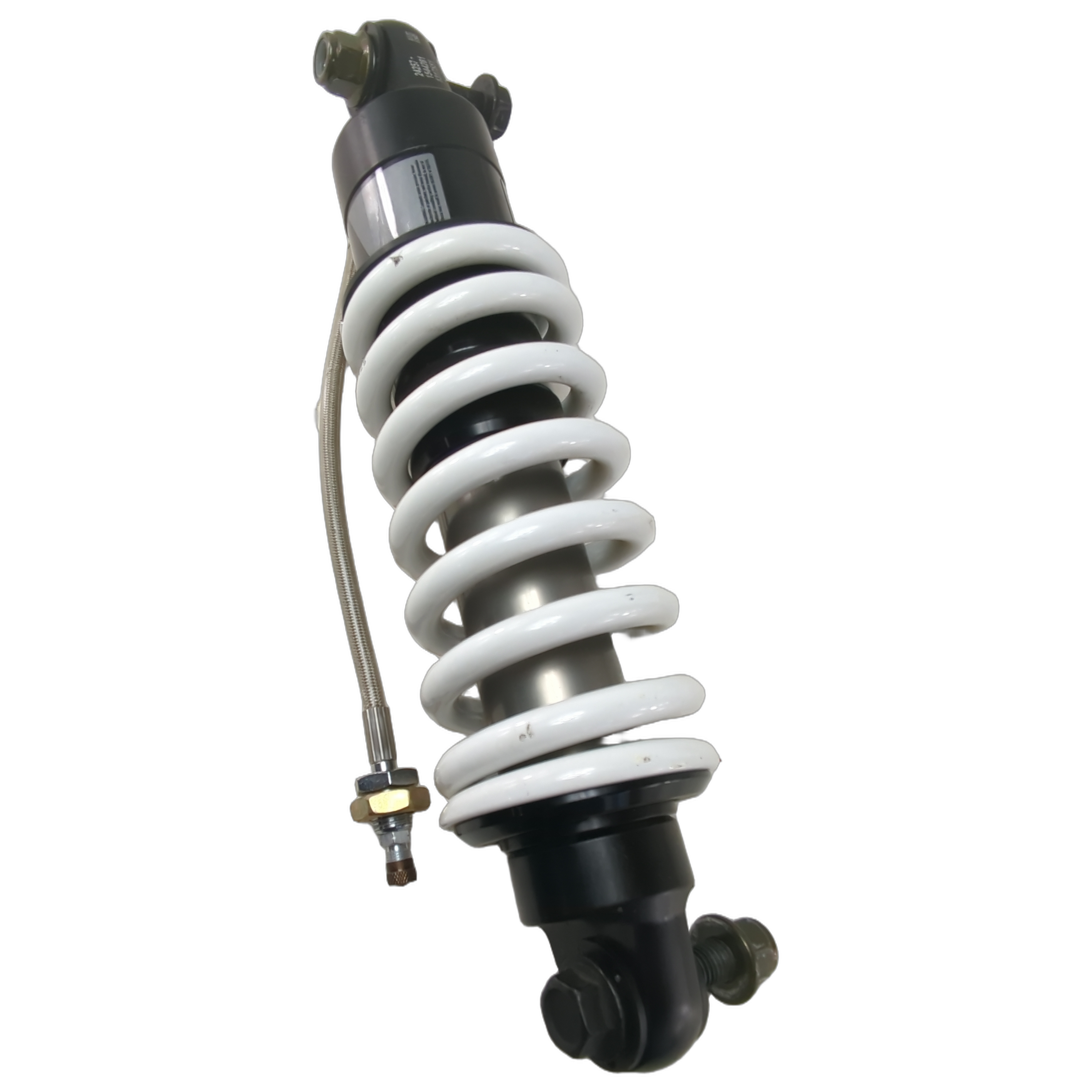 Black and white coil spring rear shock absorber with metal mounting hardware and braided hose.