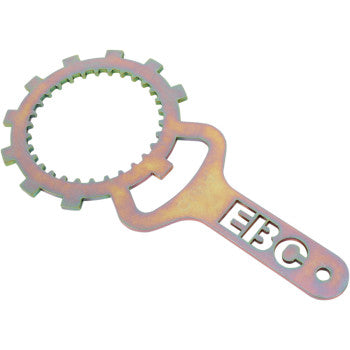 The Yamaha Clutch Basket Holding Tool by EBC features a round, gear-like end with teeth and a flat handle engraved "EBC." It's perfect for bicycle or mechanical maintenance, especially for removing clutches or loosening clutch retainer bolts.
