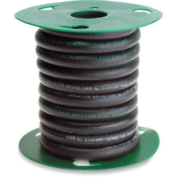 The Gates Low Permeation Fuel Line 1/4 25 features Greenshield barrier technology, is coiled between green plastic ends with white text, and is ideal for fuel-injection systems.