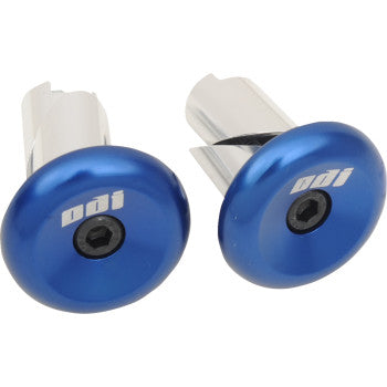 Pair of blue anodized aluminum handlebar end plugs with black center bolts and Odi logo.