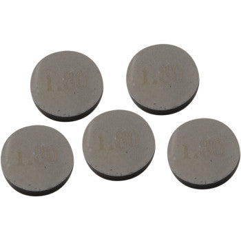 Five Prox Valve Shims (9.48 mm x 1.80 mm) are arranged loosely on a plain white background, each shim precisely machined with “1.80” etched to indicate thickness; sold as a 5 pack.