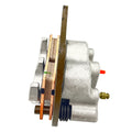 Silver metal brake caliper with copper brake pads and a visible black dust boot and bleeder valve.