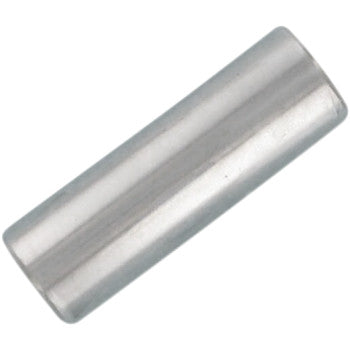 A close-up of the Wiseco Wrist Pin, a cylindrical metal pin with smooth, shiny surfaces and rounded edges, shown on a white background. Engineered for high-tech manufacturing, it delivers enhanced strength for industrial use.
