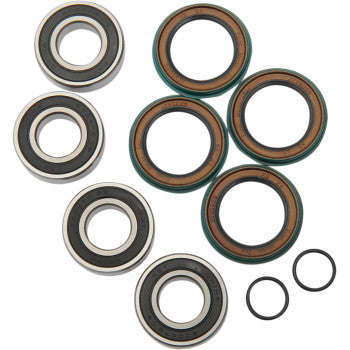 Set of metal wheel bearings and rubber seals including six circular bearings with steel outer rings and two small black.