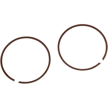 Two thin, circular metal rings with small gaps rest on a white background—Ring Set by Wiseco, designed for reliable engine performance.