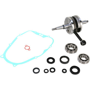 The Yamaha Crankshaft Kit YSF200 Yamaha Blaster by Wiseco includes a crankshaft, bottom-end gasket kit, bearings, and oil seals, all displayed on a white background.