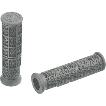 A pair of gray ATV Stealth Grips by Moose Offroad, featuring a textured, durable compound with embossed branding. The high-traction surface provides improved control and long-lasting performance for motorcycles or bikes.