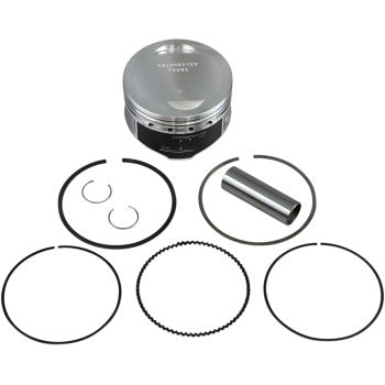 The Yamaha Piston Kit 85.00 mm by Wiseco includes a forged piston, rings, wrist pin, and two circlips arranged on a white background—perfect for performance engine upgrades.