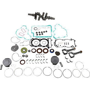 Complete Polaris engine rebuild kit with metal crankshaft, black pistons, various rubber gaskets, metal rings, seals, and.
