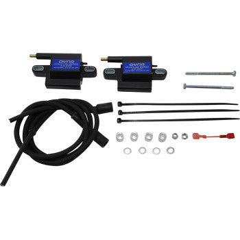 The Kawasaki Teryx Ignition Coil Kit by Dynatek includes two CDI ignition coils, spark plug wires, wiring adapters, zip ties, bolts, washers, nuts, a fuse, and black tubing—all neatly arranged on a white background.