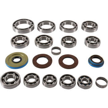 The Polaris Transaxle Bearing Seal Kit by Moose Offroad, featuring EMQ bearings, needle bearings, and circular rubber seals, displayed in neat rows on a white background.