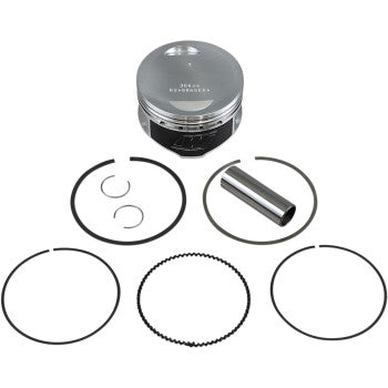 The Yamaha Piston Kit 84.50 mm by Wiseco includes a silver forged piston, piston pin, two circlips, and four 4-stroke rings arranged neatly on a white background—ideal for performance engine upgrades.
