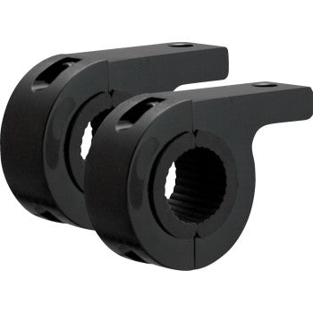 Two black, cylindrical Clamp Mount 3/4" Pair by Vision X with flat extended tabs are shown side by side. Each clamp has a ribbed inner surface and a rubber insert for grip and stability, and appears to be made of metal.