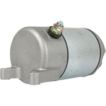 The Starter Motor by Parts Unlimited is a silver, slightly textured, metallic cylinder with copper bushings, a mounting bracket, and a top bolt—ideal as a small engine starter motor.