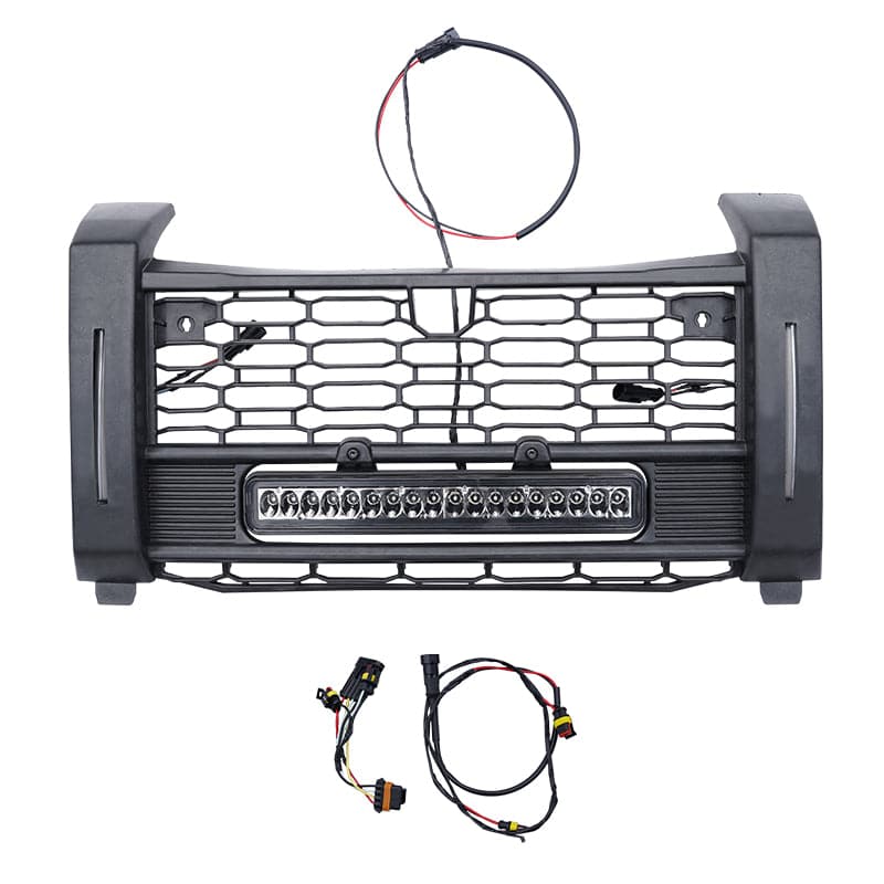 The Polaris XPEDITION ADV/XP Front Mesh Grill with Accent Light by Kemimoto, shown in black with an integrated LED and three wiring harnesses and connectors, fits Polaris Xpedition ADV 2024 and XP 2024 models on a white background.