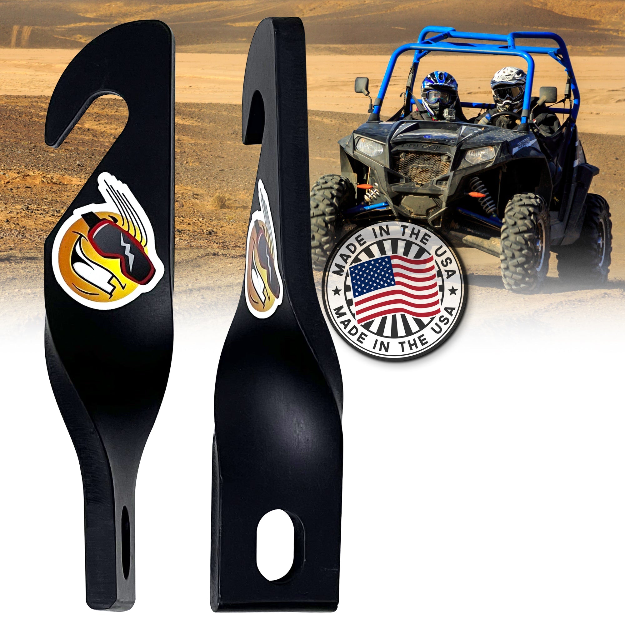 Two black Easy-Cool UTV Door Latches Hook Style by Keep Smiling Powersports with colorful logo stickers are in the foreground to boost airflow for a cooler ride, with an off-road vehicle, two helmeted riders, a Made in the USA badge, and desert landscape behind.