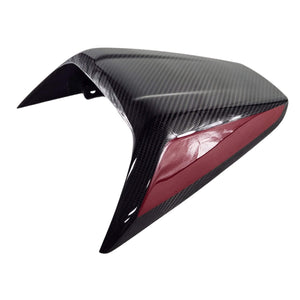 The Asm-Cowl Seat Cf/Grfx by Polaris, shown on a white background, features black carbon fiber with a bold red side accent.