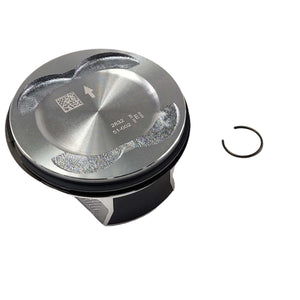 A shiny metal piston assembly with a flat top surface and a circular retaining clip on the right, set against a white background—Assembly, Piston [Incl. Rings, Pin, Ret. Rings] by Polaris, an essential OEM part for your Victory motorcycle.