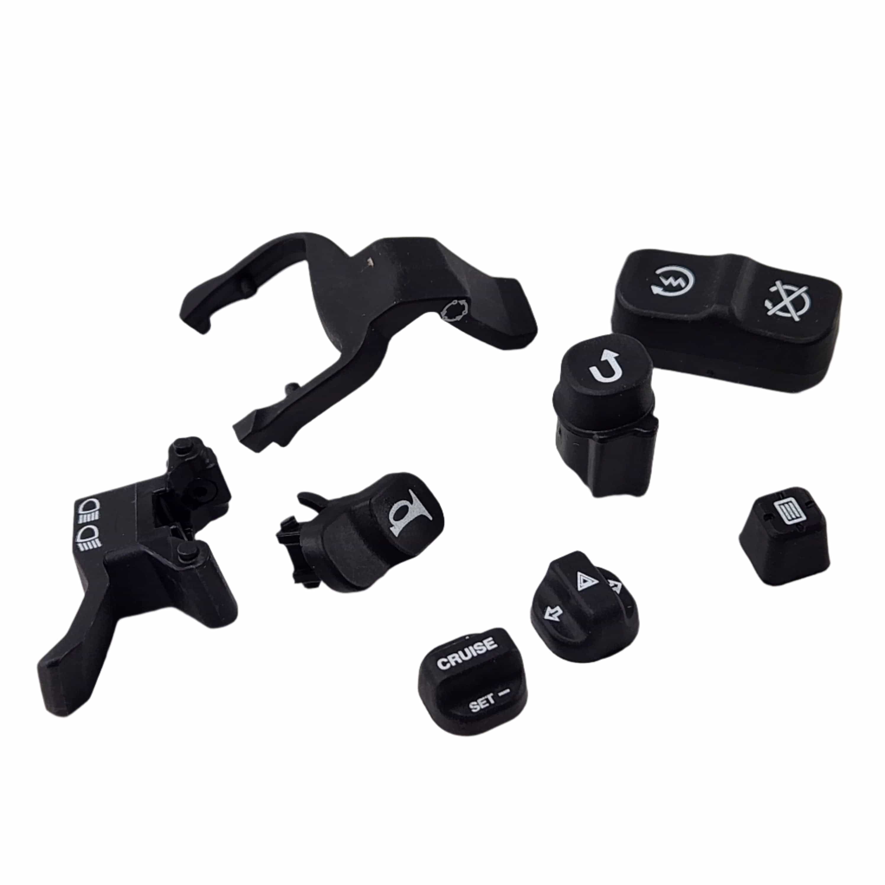 Assorted black K-Handswitch Cap Service by Polaris and other OEM buttons with white icons for motorcycle handlebars—features symbols for headlights, horn, cruise control, and more, all displayed on a white background.