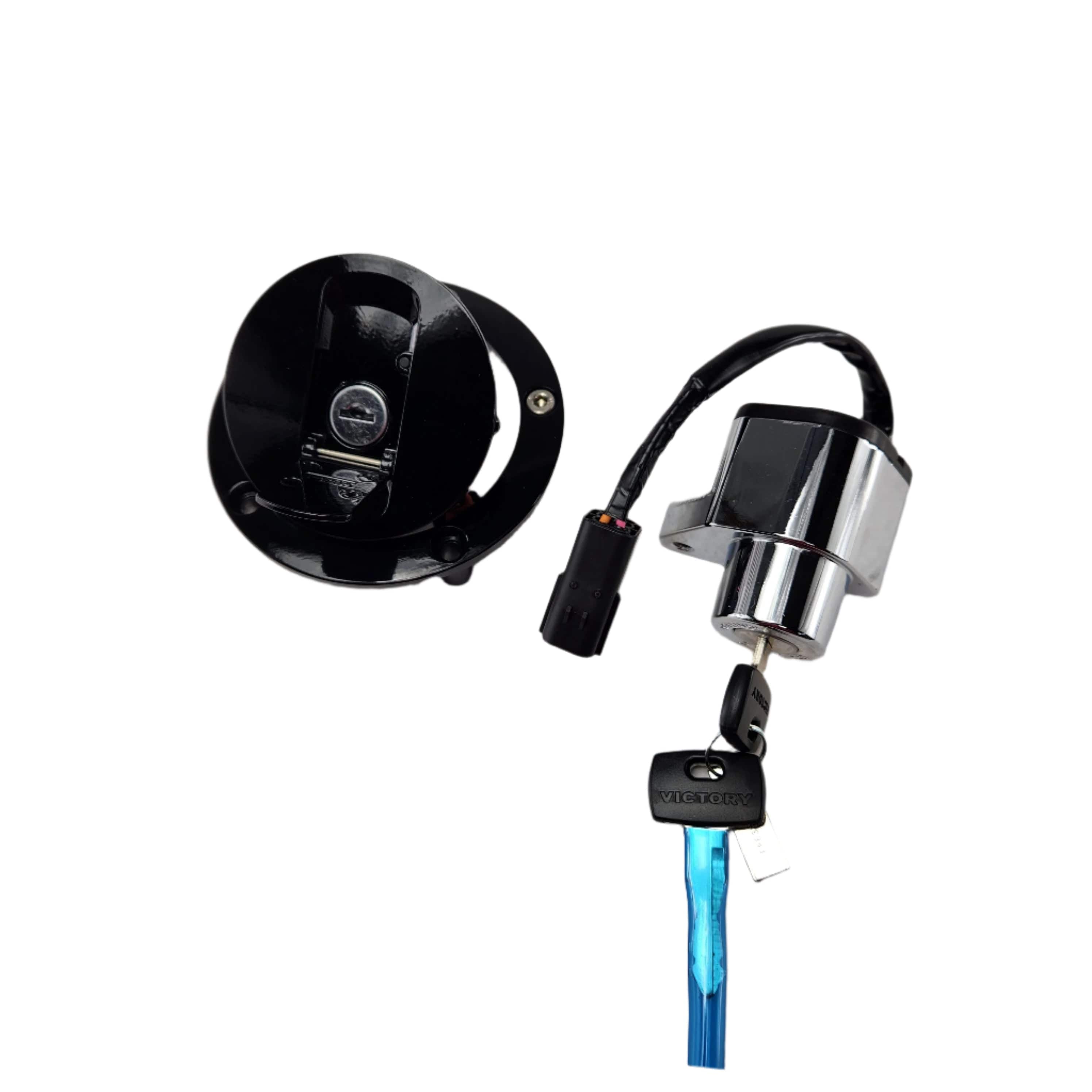 A Polaris Ignition Switch/Fuel Cap in black and silver, shown with wiring and a key in the ignition, displayed against a white background.