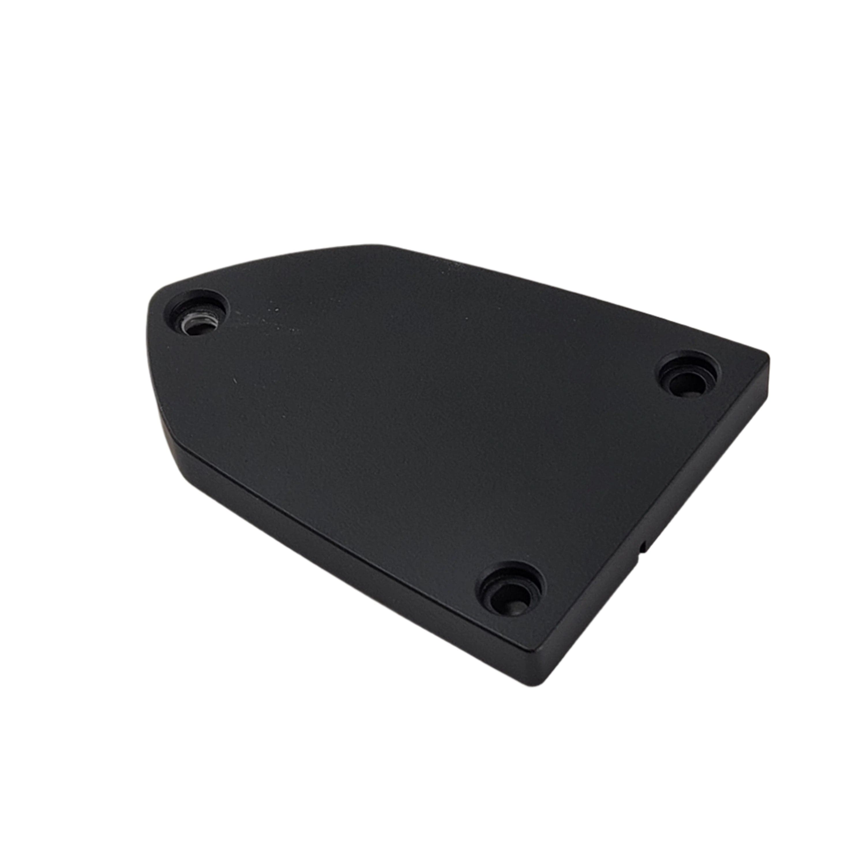 The Front Brake Master Cylinder Cover Plain Black by Taylor Specialties is a wedge-shaped plate with three screw holes, made of black plastic or billet aluminum—perfect for Victory motorcycle accessories.