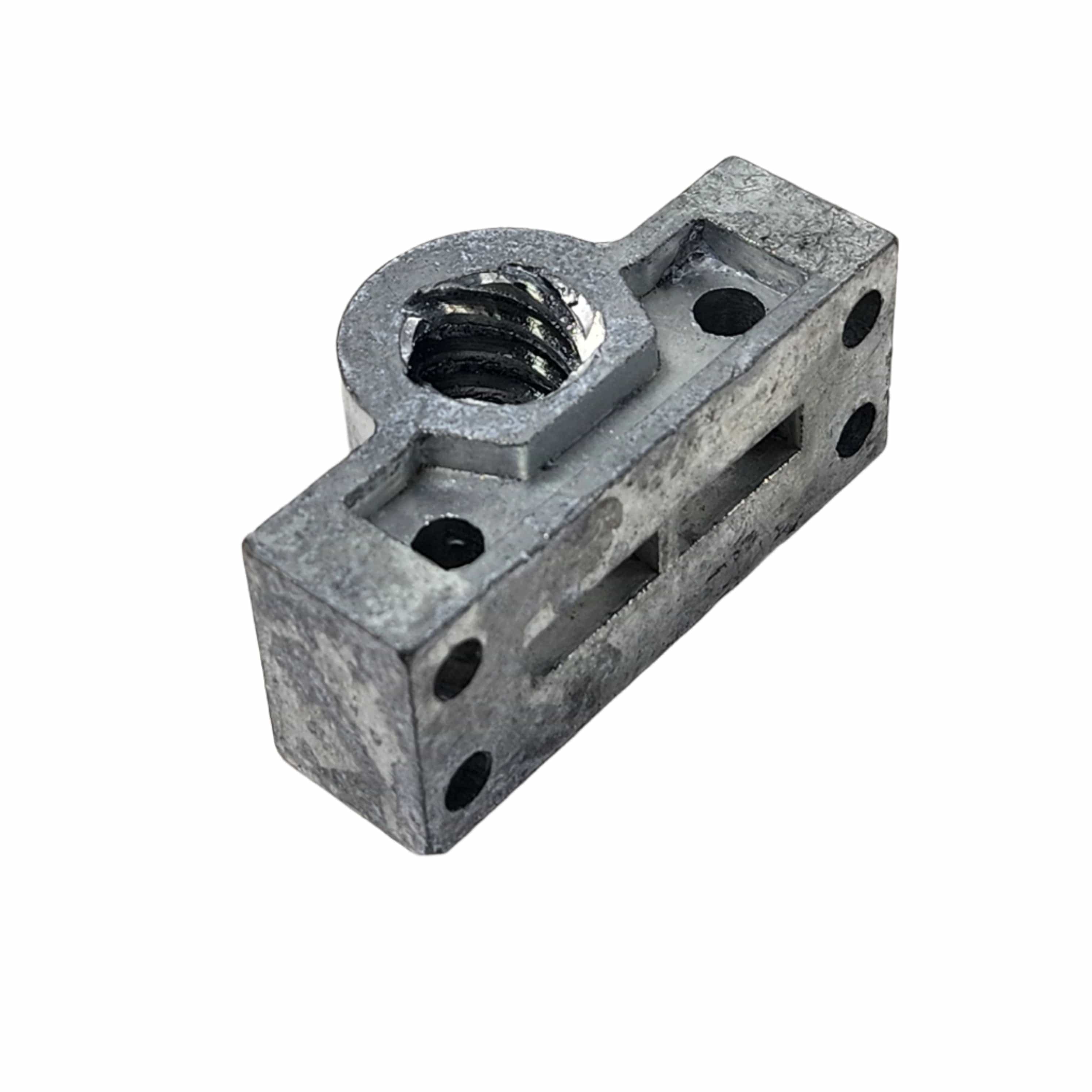 A rectangular metal bracket with a large center threaded hole and four corner holes, perfect for mounting the Indian Motorcycles Windshield Motor Gear Silver by Witchdoctors. The surface shows slight wear.