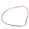 A thin, flexible, reddish-brown Primary Gasket for Indian Challenger by Polaris—an essential OEM part—lies irregularly shaped on a white background.
