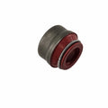 A close-up of the Valve Stem Seal by Polaris, showing its metal casing, red rubber seal, and external spring—ideal for ATV off-road vehicles—isolated on a white background.