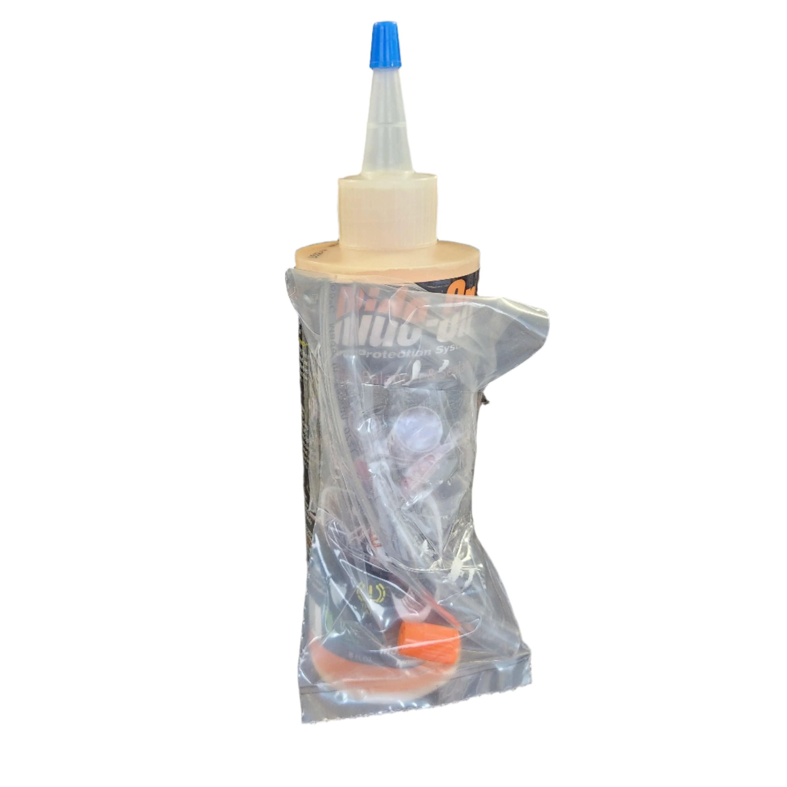 An 8oz tube of Ride On Tire Balancer and Sealant with a blue nozzle, packaged in clear plastic with extra small accessories, perfect for tire protection systems, shown against a white background.
