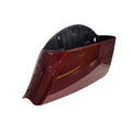 A shiny red Assembly Saddlebag RH by Polaris with a black interior is displayed on a white background, angled to show the side and inner edge—perfect for those seeking authentic OEM Indian Polaris parts.