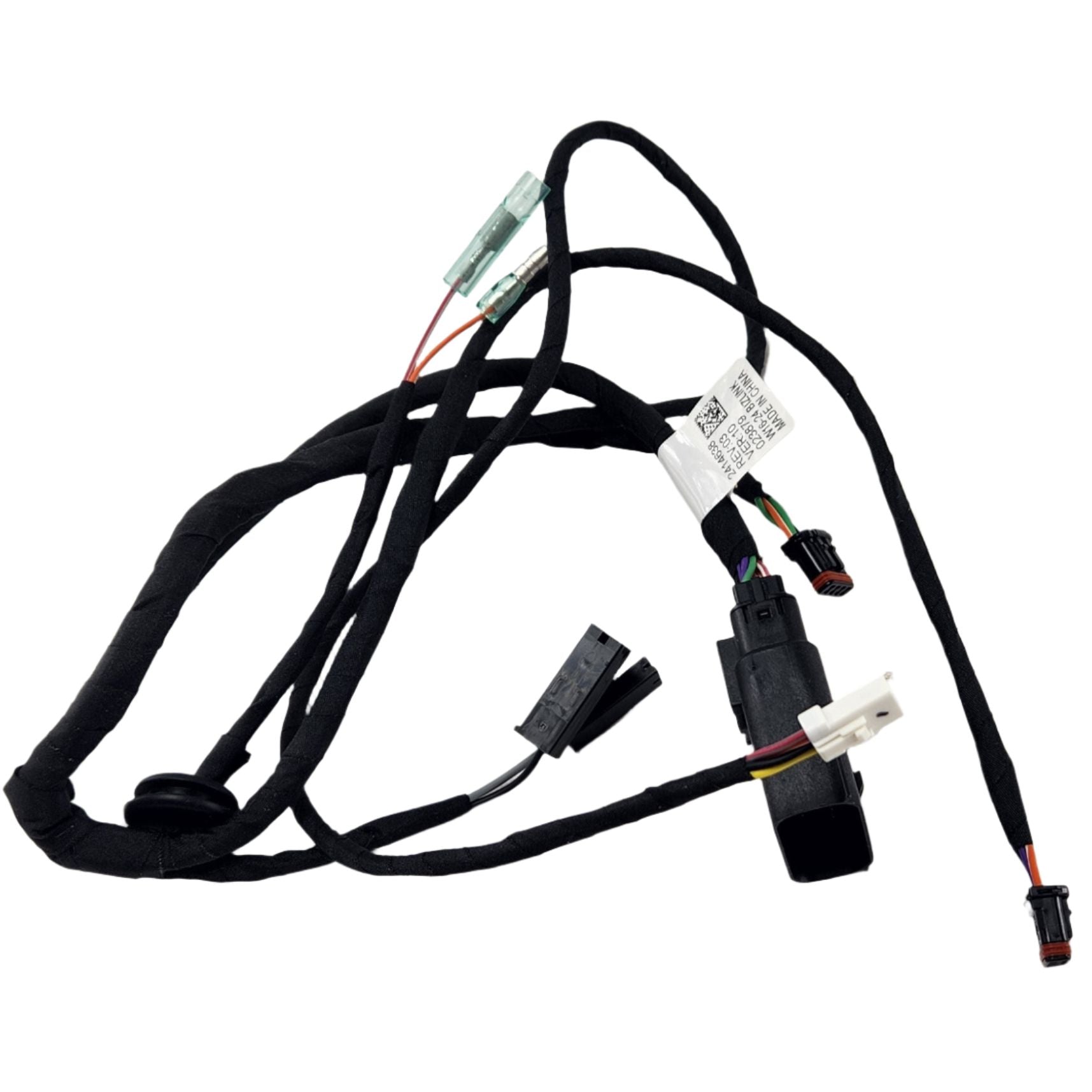 The Trunk Harness Audio V2 by Polaris, a black automotive wiring harness with colored wires, multiple connectors, green fuses, and a QR code label, is shown on a white background and fits Indian motorcycles and other OEM Polaris parts.