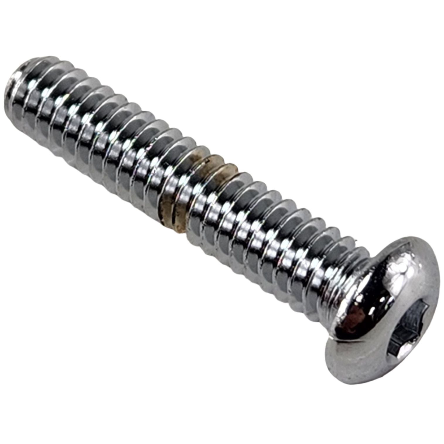 A close-up of the Screw by Polaris—a shiny, silver metal screw with a round head and hexagonal socket on a white background, designed as an essential OEM part for your Indian motorcycle.