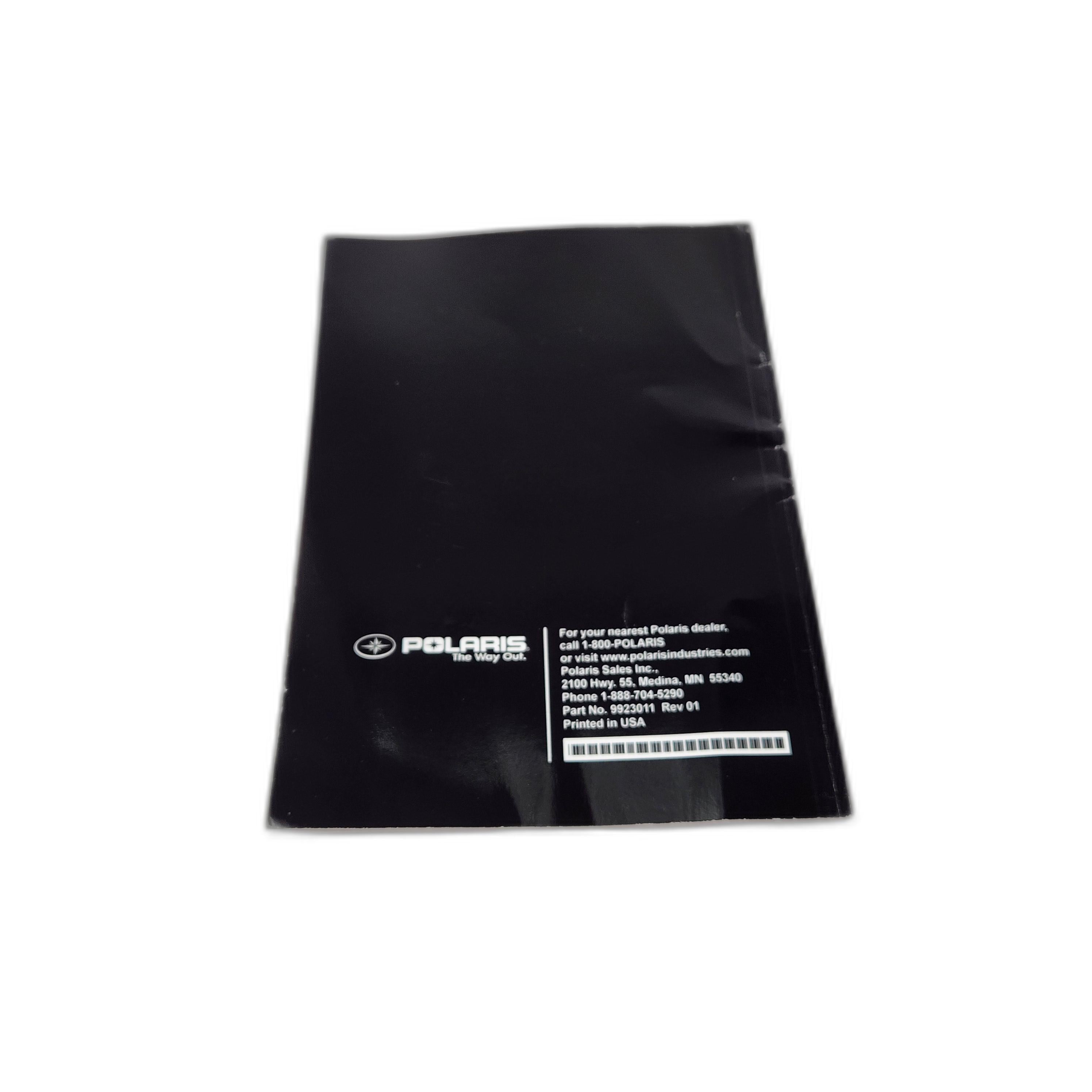A black plastic sleeve displaying the Polaris logo and contact info in white, perfect for storing the Manual, Owners, 2011 Kingpin/Vegas/H/Jack by Polaris, shown on a plain white background.