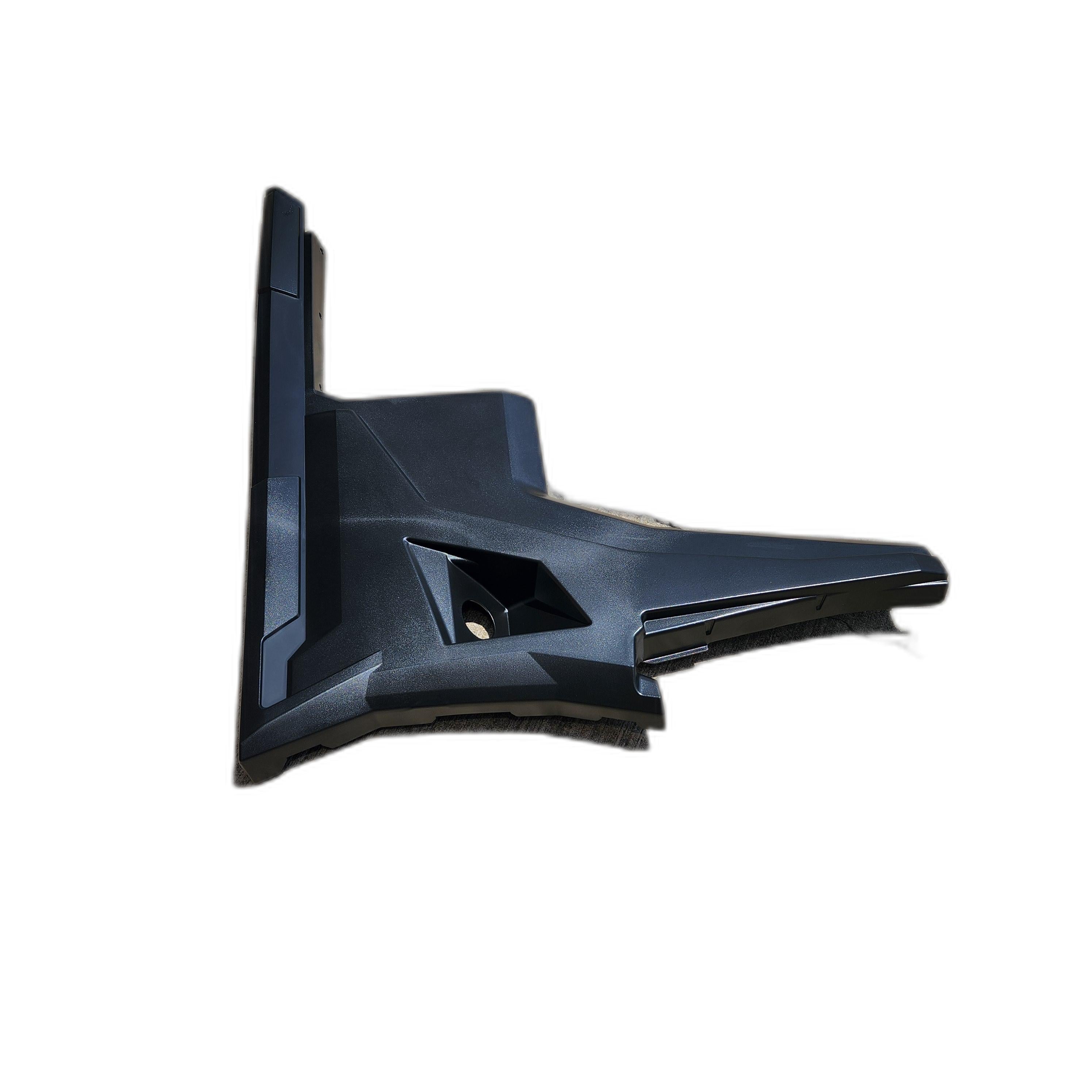 A black, angular plastic Panel, Side - Cab - Left By Arctic Cat with textured surfaces and a hollow section, photographed on a white background—perfect as an OEM Arctic Cat part or essential UTV accessory.