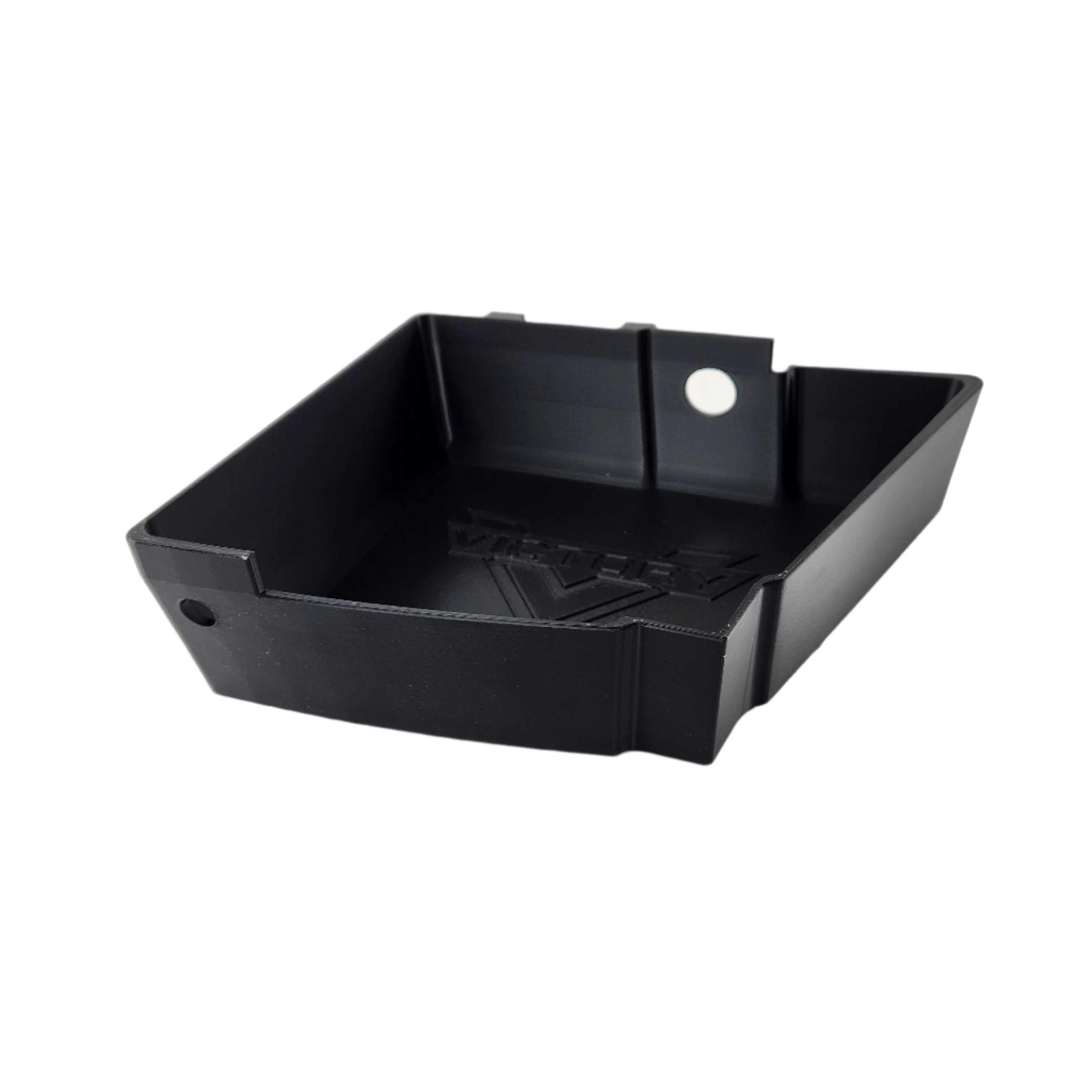 The Saddlebag Organizer Tray by Disruptive Misfit Solutions is a black, rectangular plastic tray with raised sides, a circular corner hole, and embossed inside text—perfect for organizing storage in your Victory Cross Country motorcycle.