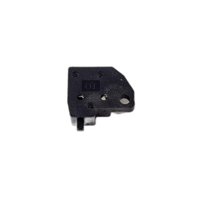 Kit, Switch [Incl. Screw And Washer] by Polaris—black rectangular component with multiple holes and a small protrusion, perfect as an OEM switch replacement for Victory Polaris or other Victory motorcycles. Shown on a white background.