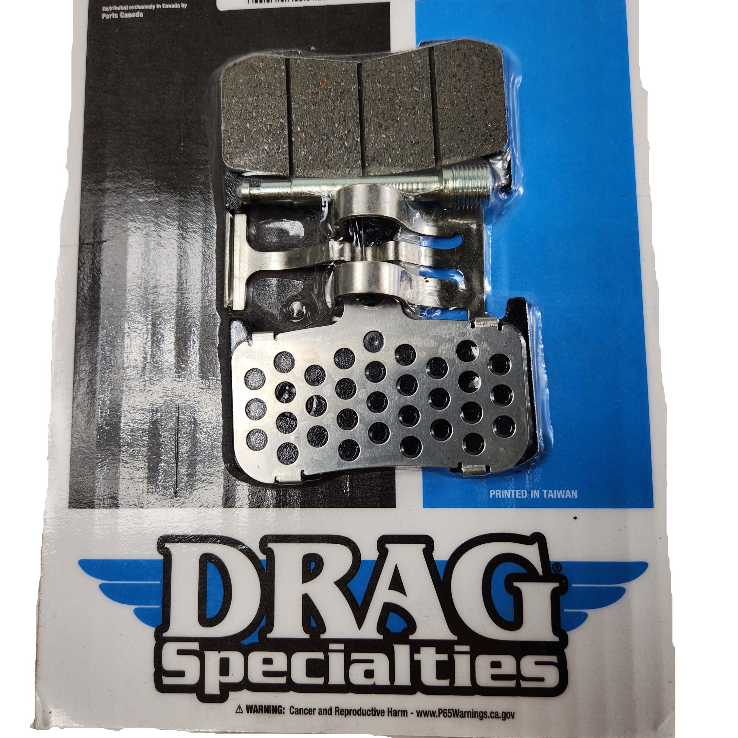 A packaged Semi-Metallic Front Brake Pads by Drag Specialties on a DRAG Specialties card with a blue and white logo, featuring semi-sintered pads and a cancer/reproductive harm warning.