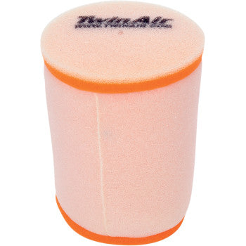 The Kawasaki Standard Air Filter by Twin Air is a cylindrical, peach-colored filter with orange trim on the top and bottom edges, designed for optimal airflow and featuring black text printed on the top surface.