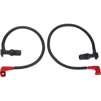 Pair of black spark plug wires with flexible ribbed insulation and red right-angle connectors on one end and black.