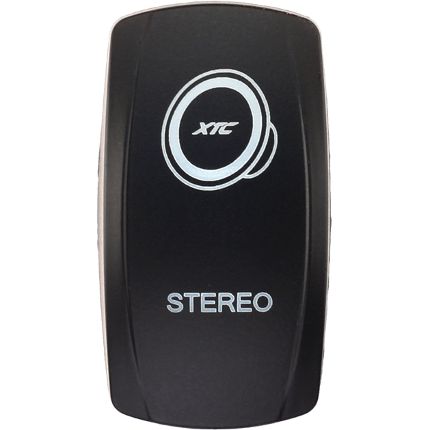 A sleek, curved black Dash Switch Rocker Face Stereo by XTC Power features “STEREO” and the XTC logo printed in white on the front.