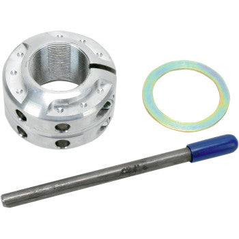 Silver metal axle locknut with adjustable design, accompanied by a blue-tipped metal rod and a thin gold-toned washer.
