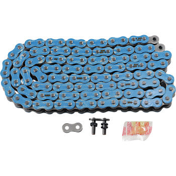 The 530 Max X Chain 120 Links Blue by Rk features a coiled blue O-ring chain, metal master link, two black chain pins, and a lubricant packet, all displayed on white. Built for high tensile strength and durability.