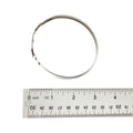 Silver metal large clamp with slotted tightening mechanism, shown next to clear ruler for scale.
